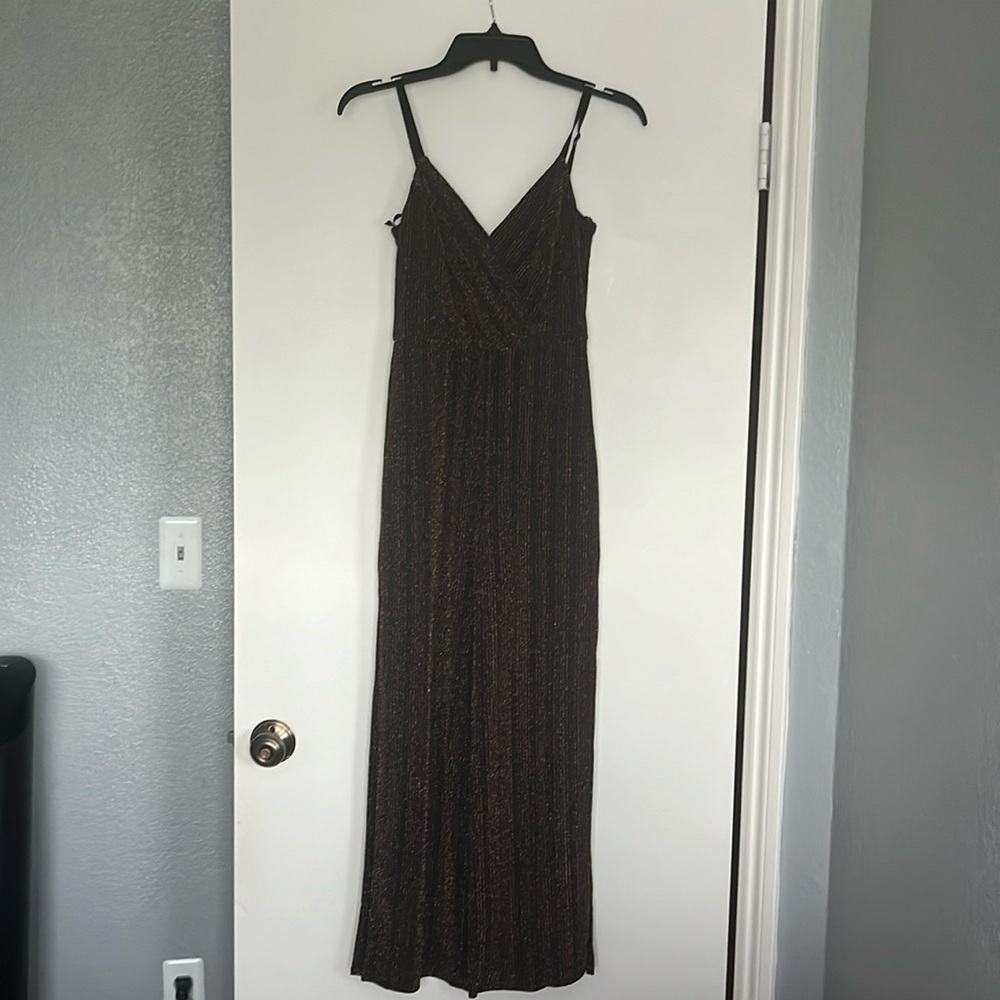Black and rose gold jumpsuit, stretchy and new with tags!